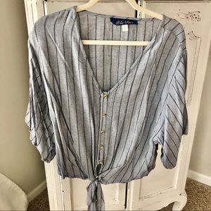 New with tags Francesca’s blue rain blouse